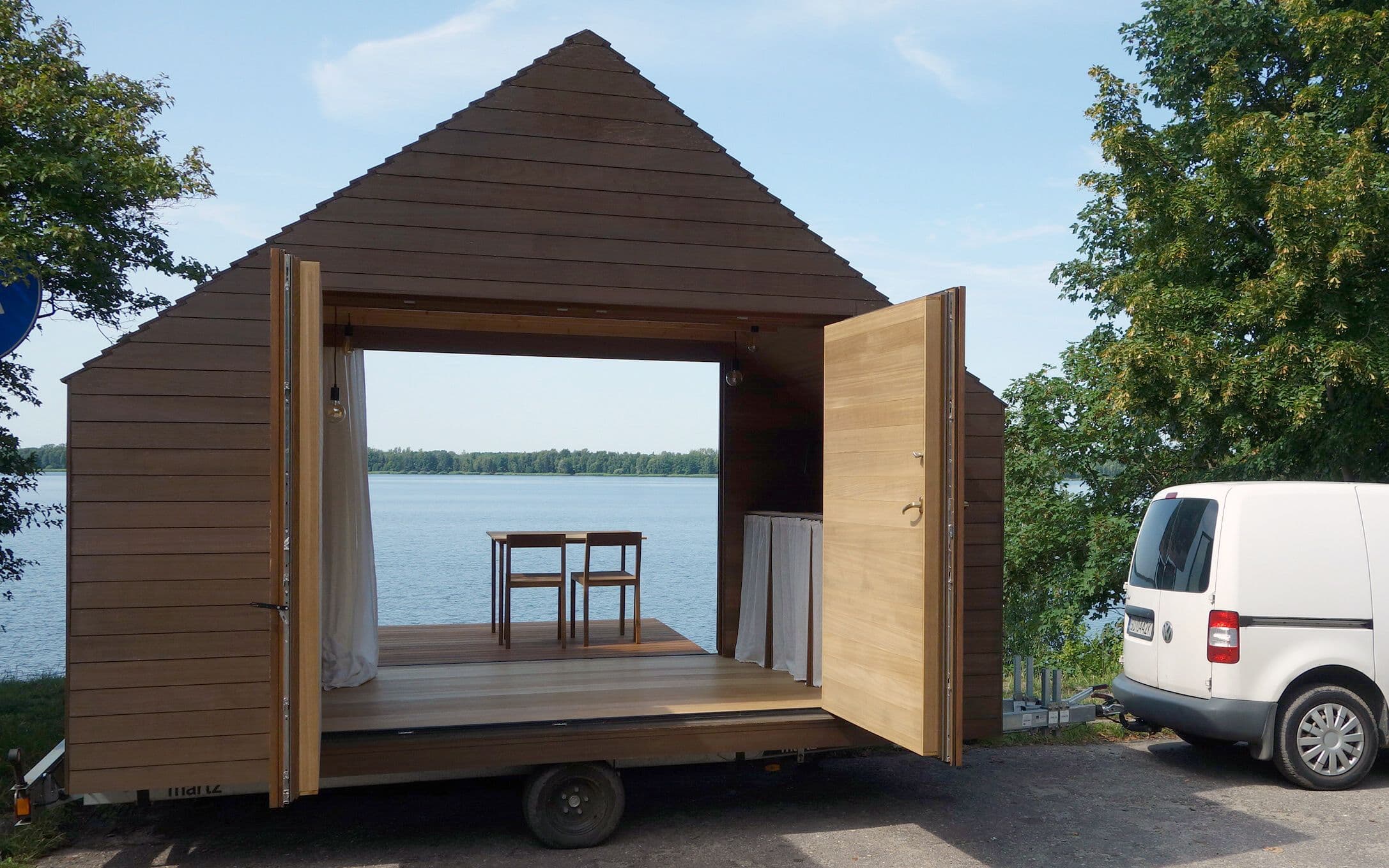 Ultralight mobile home for geographical freedom and off-grid living, towed with a standard category B driver's license.